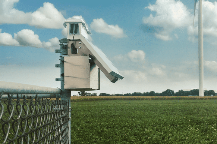 RTK Unit Mounted to a chain link fence