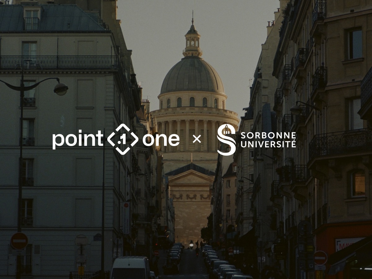 A view of the Panthéon in Paris at dusk, framed by Parisian buildings and cars on the street. Overlaid are the logos for point.one and Sorbonne Université, highlighting the city's blend of heritage, innovation, and robotics.