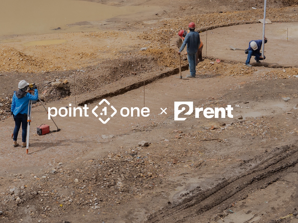 Four construction workers in helmets use surveying equipment, including GNSS pre-processing tools, at an uneven, muddy site. The “point one” and “2rent” logos are overlaid at the center of the image.