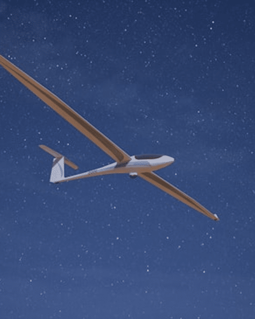 A white glider with long wings soars through a starry night sky, illuminated by soft light.