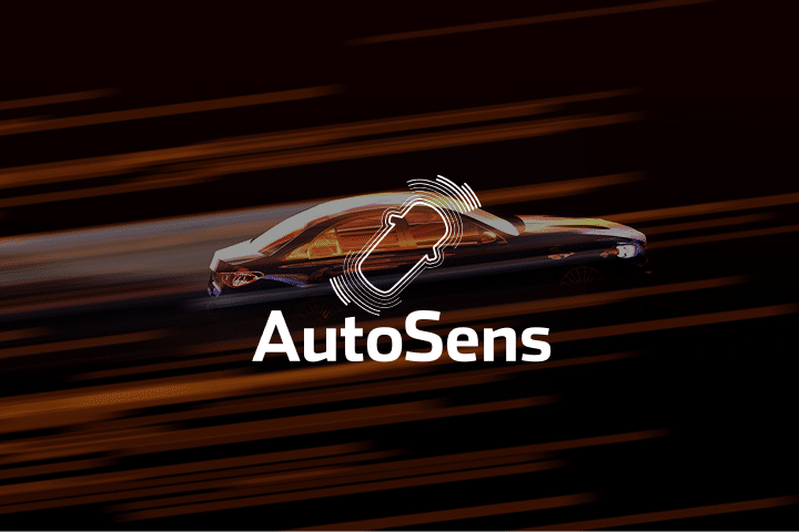 A blurred car in motion with orange streaks in the background. The word AutoSens and a sensor icon are superimposed over the car.