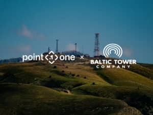 Point One Navigation and Baltic Towers logos overlaid on a landscape of rolling hills and communication towers.